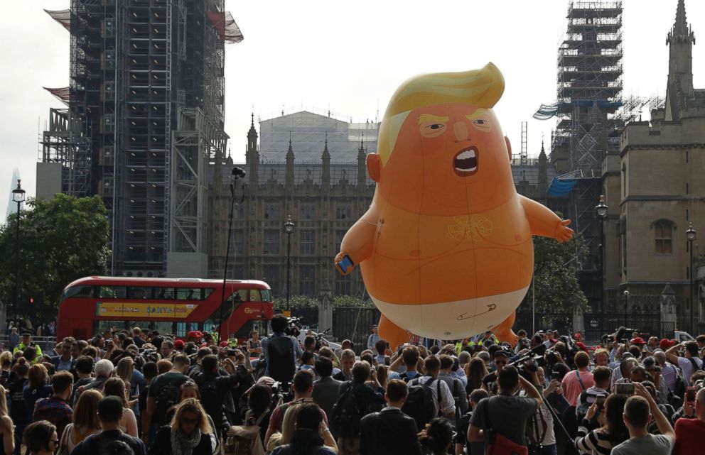 PHOTO: A six-meter high cartoon baby blimp of President Donald Trump is flown as a protest against his visit, in Parliament Square in London, July 13, 2018.