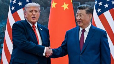 PHOTO: President Donald Trump shakes hands with Chinese President Xi Jinping at the Great Hall of the People, May 14, 2026, in Beijing.