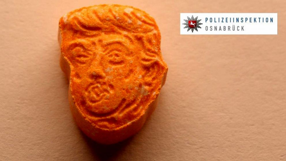 This undated picture provided by Polizeiinspektion Osnabrueck police shows an ecstasy pill. German police say they have seized thousands of ecstasy pills in the shape of President Donald Trump's head.