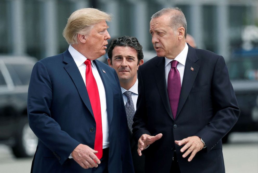 PHOTO: President Donald Trump and Turkish President Tayyip Erdogan talk at the start of the NATO summit in Brussels, Belgium, July 11, 2018.