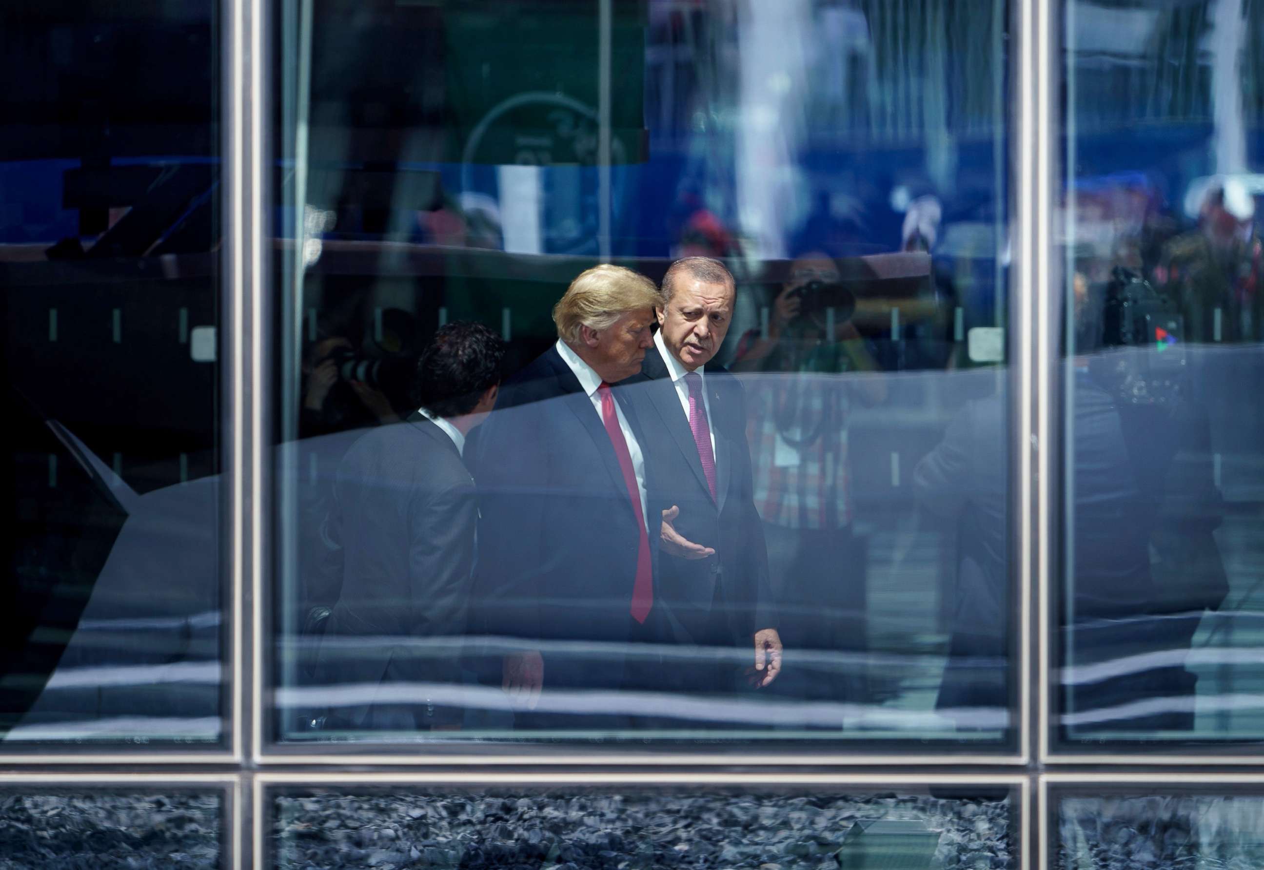 PHOTO: President Donald Trump and Turkey's President Recep Tayyip Erdogan talk during the NATO (North Atlantic Treaty Organization) summit in Brussels, July 11, 2018.