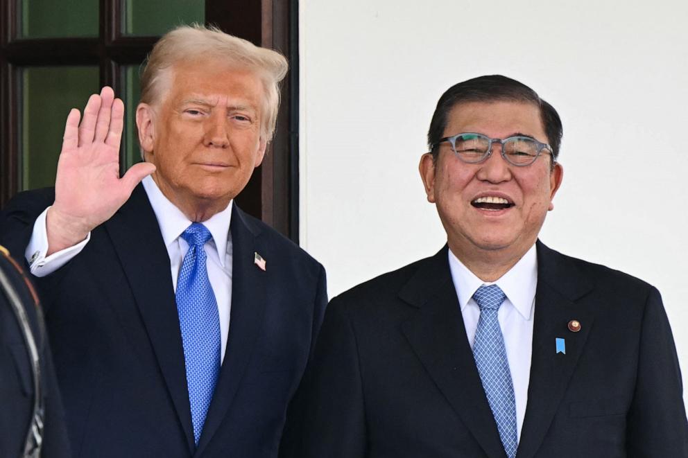 PHOTO: In this file photo, President Donald Trump waves as he greets Japanese Prime Minister Shigeru Ishiba upon arrival outside the West Wing of the White House in Washington, DC, on Feb. 7, 2025.