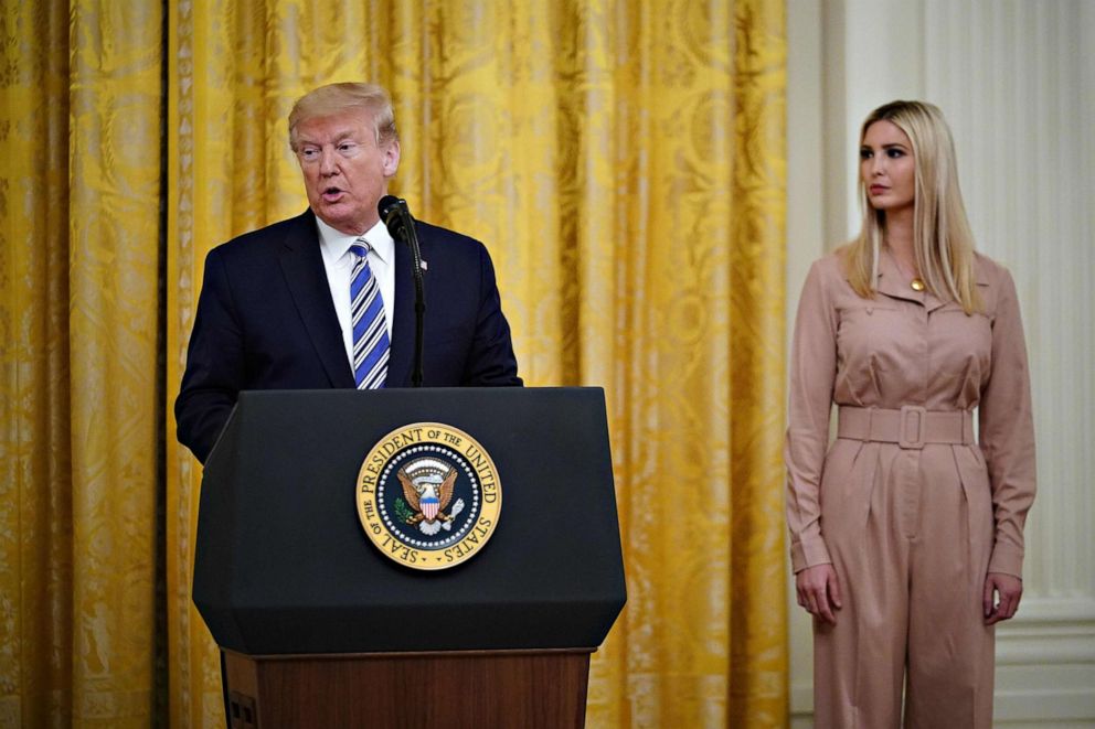 PHOTO: President Donald Trump, with his daughter and Senior Advisor Ivanka Trump, speaks in the East Room of the White House, in Washington, on April 28, 2020.