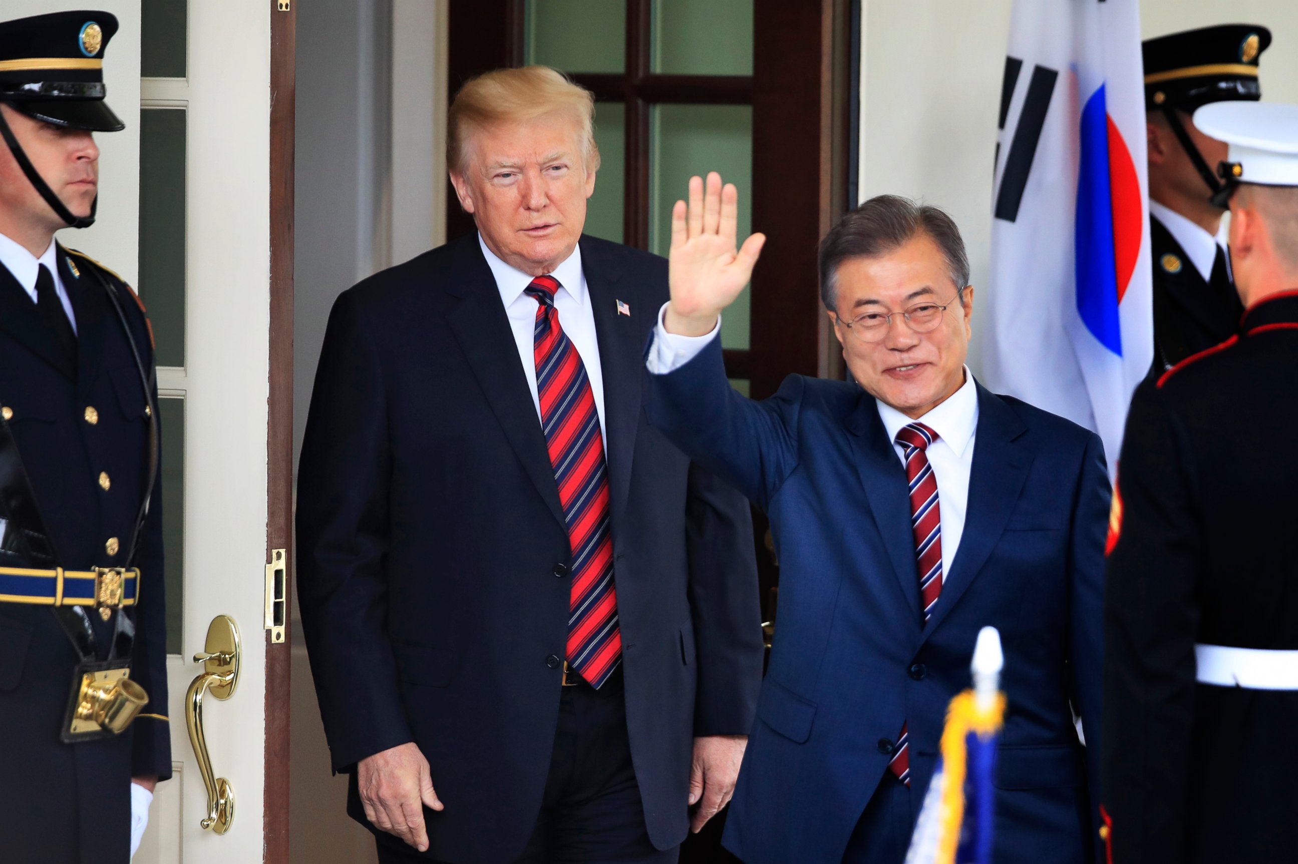 PHOTO: South Korean President Moon Jae-in waves as he is welcomed by President Donald Trump to the White House in Washington, May 22, 2018.