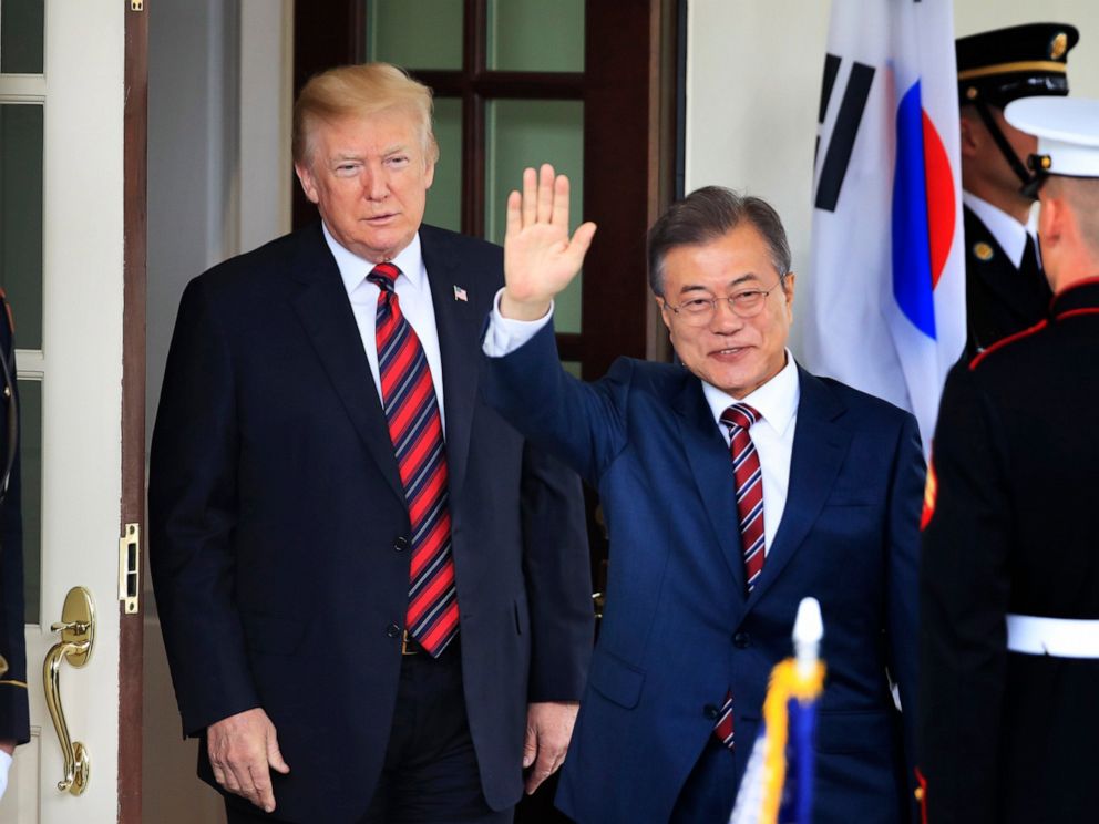 PHOTO: South Korean President Moon Jae-in waves as he is welcomed by President Donald Trump to the White House in Washington, May 22, 2018.