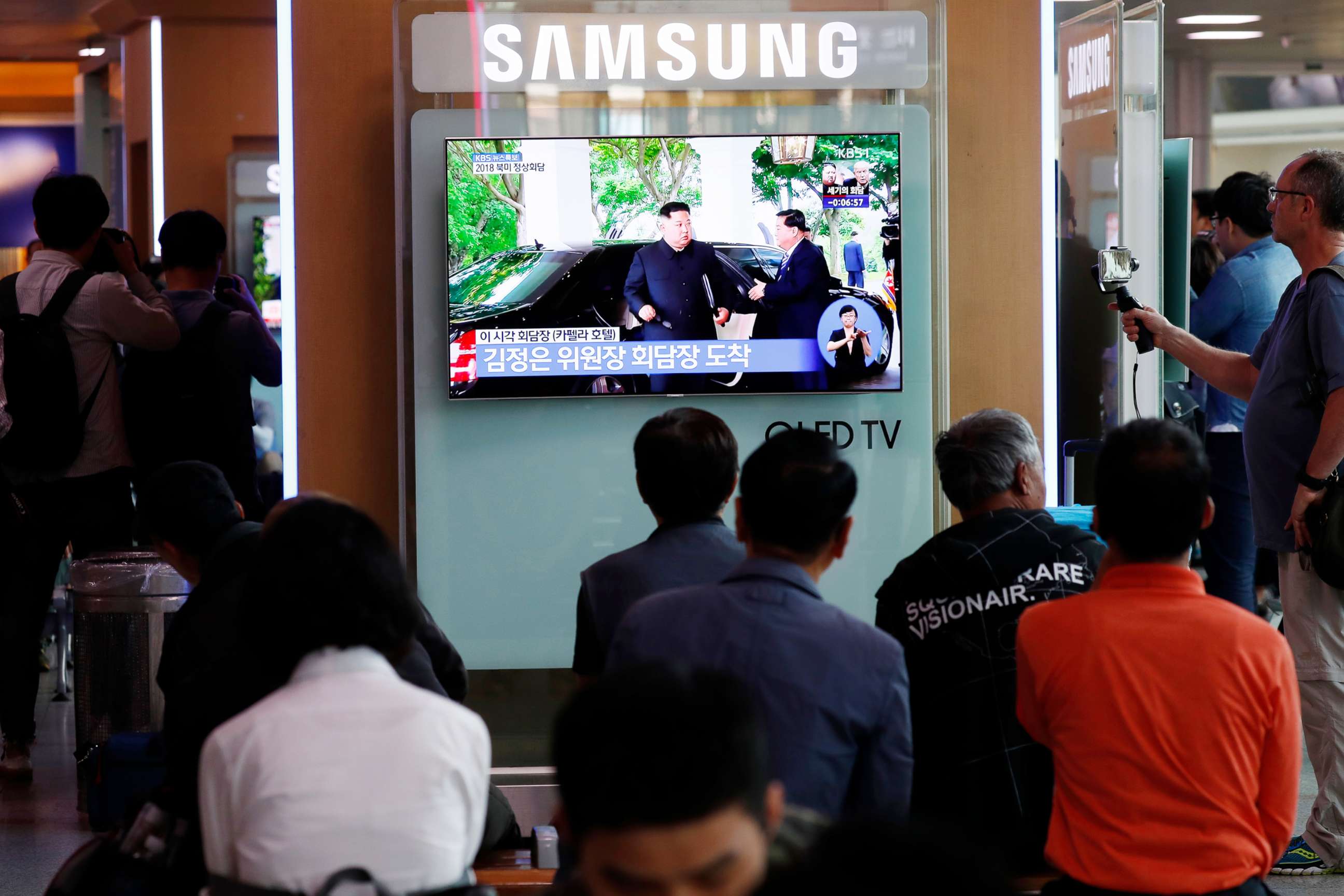 PHOTO: South Koreans watch a TV screen displaying a broadcast of the historic meeting between President Donald J. Trump and North Korean leader Kim Jong-un in Singapore, at a station in Seoul, South Korea, June 12, 2018.