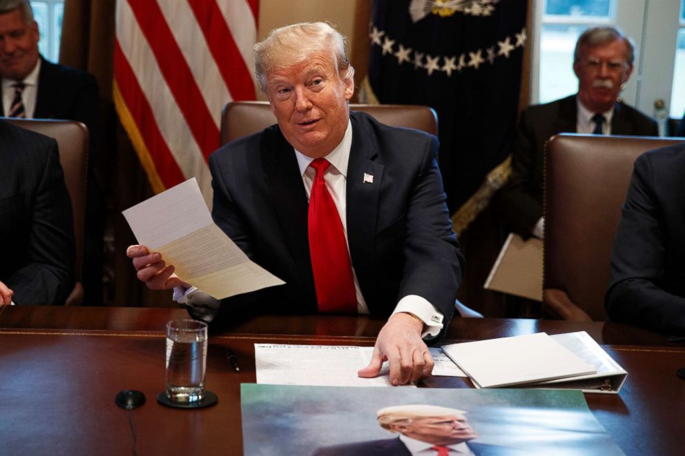 PHOTO: President Donald Trump holds up a letter he says is from North Korean leader Kim Jong Un during a cabinet meeting at the White House, Jan. 2, 2019, in Washington.