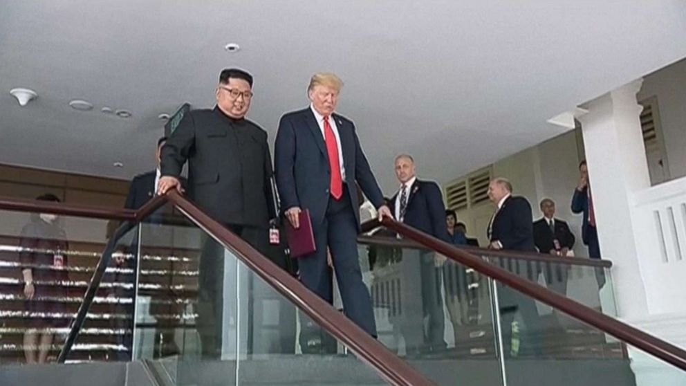 PHOTO: President Donald Trump and Kim Jong Un are pictured at their summit in Singapore in video shown on North Korean state television.