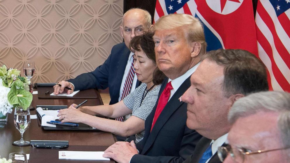 President Donald Trump and his translator and delegation sit down with North Korean leader Jim Jong Un and his delegation at the Capella Hotel on Sentosa island in Singapore on June 12, 2018.