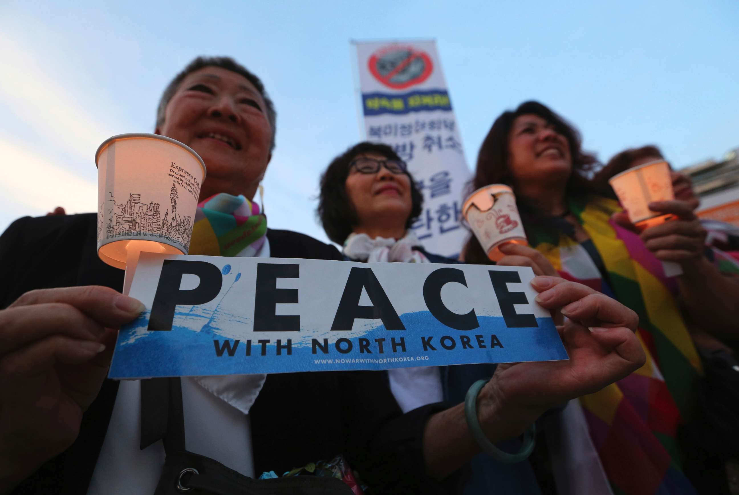 PHOTO: Protesters hold candle lights during a rally to denounce the United States' policies against North Korea near the U.S. embassy in Seoul, South Korea, May 25, 2018. 