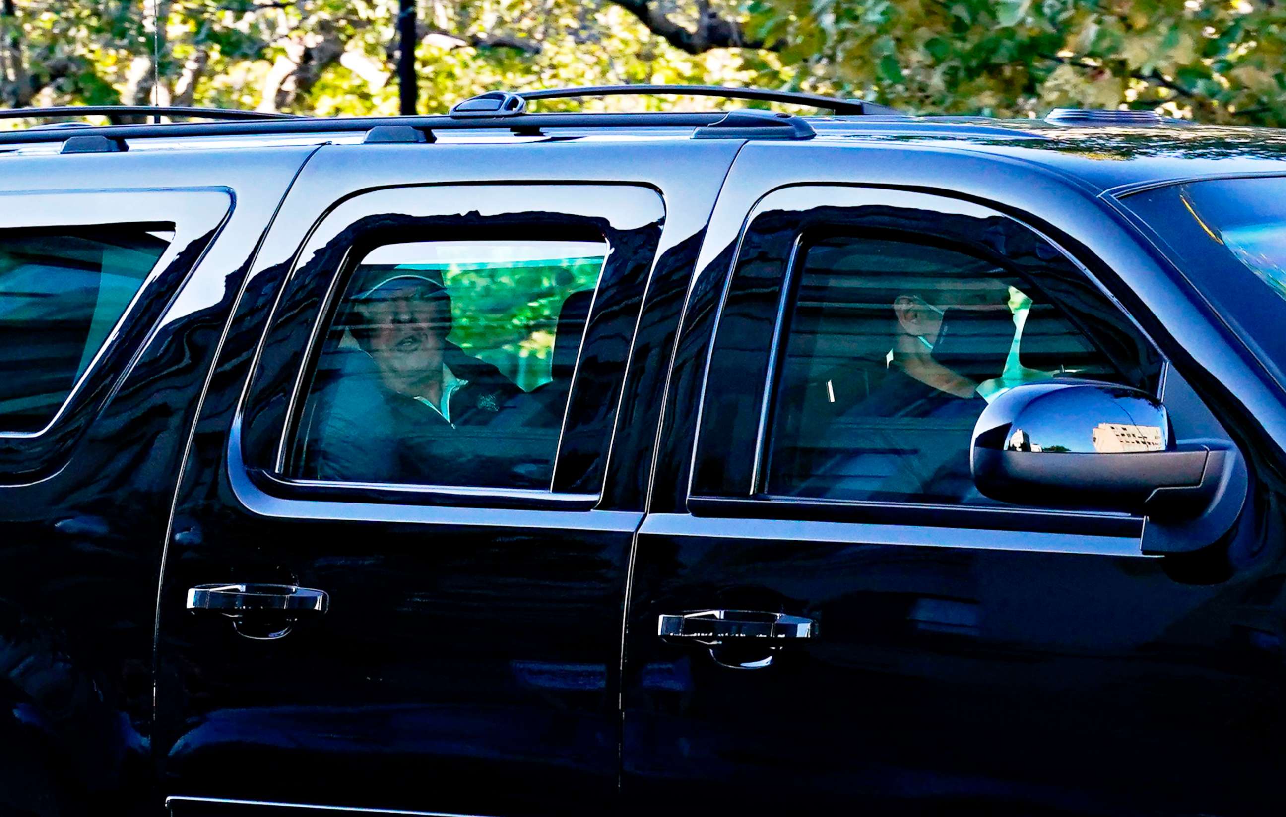 PHOTO: President Donald Trump watches from his limousine as he returns from playing golf to the White House in Washington on Nov. 7, 2020, following news that Joe Biden was declared the winner of the 2020 Presidential Election by major news organizations.