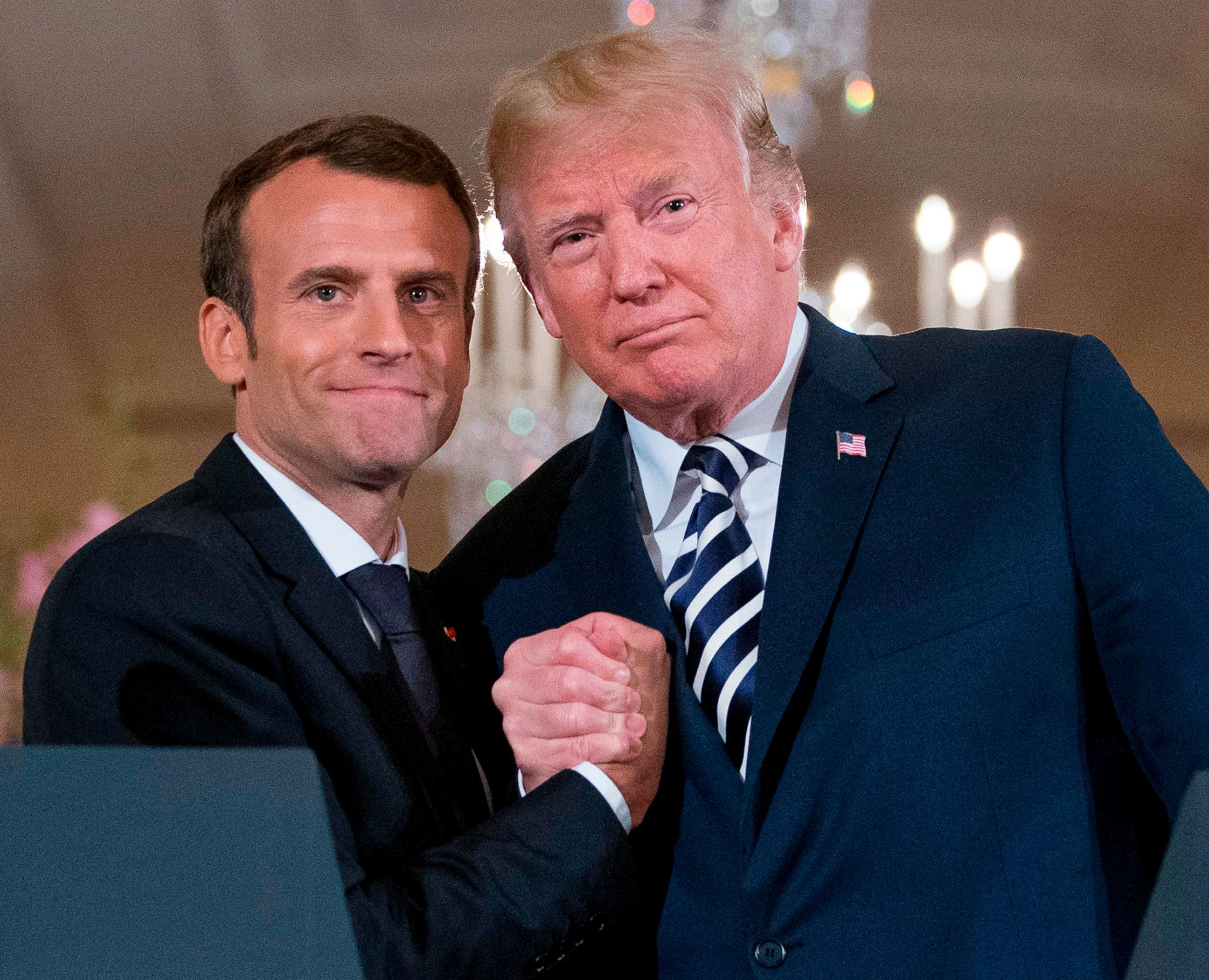 PHOTO: President Donald Trump and French President Emmanuel Macron embrace at the conclusion of a news conference in the East Room of the White House in Washington, April 24, 2018.