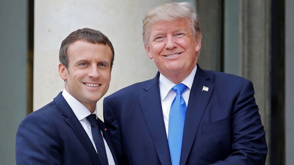 French President Emmanuel Macron greets President Donald Trump at the Elysee Palace in Paris, July 13, 2017.