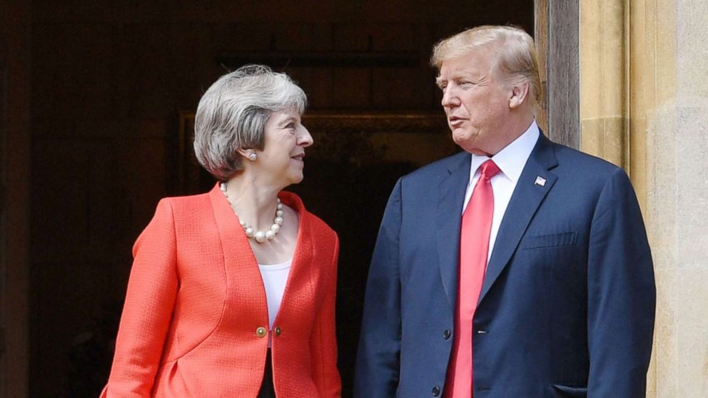 PHOTO: President Donald Trump and Britain's Prime Minister Theresa May stand together upon Trump's arrival for a meeting at Chequers, the prime minister's country residence, near Ellesborough, northwest of London, July 13, 2018.