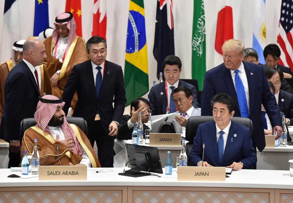 PHOTO: U.S. President Donald Trump, right, looks back at Saudi Arabia's Crown Prince Mohammed bin Salman, left, as Japan's Prime Minister Shinzo Abe, right bottom, looks on at the G-20 Summit in Osaka Saturday, June 29, 2019.