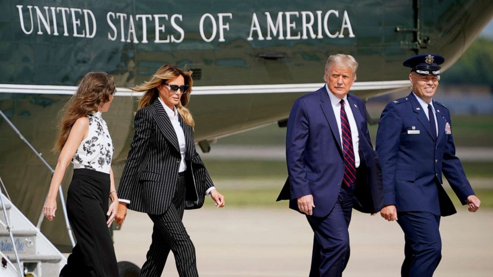 PHOTO: President Donald Trump and first lady Melania Trump walk to board Air Force One to travel to the first presidential debate in Cleveland, Sept. 29, 2020, in Andrews Air Force Base, Md.