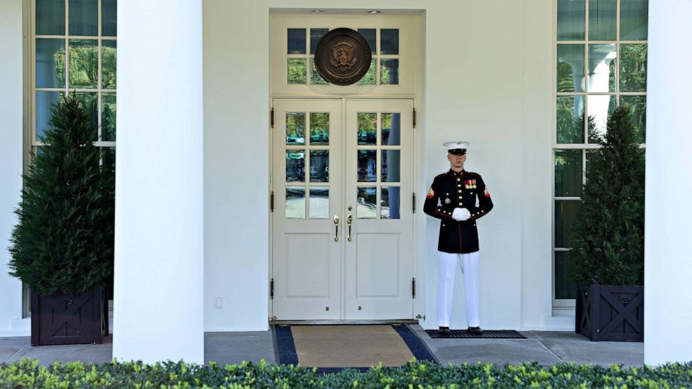PHOTO: A Marine is posted at the West Wing door, an indication that President Donald Trump is in the Oval Office, at the White House in Washington, Oct. 7, 2020.