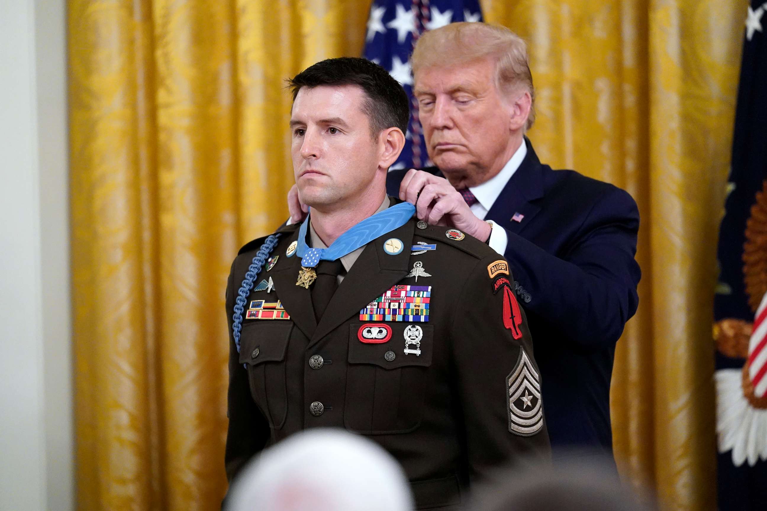 PHOTO: President Donald Trump gives the Medal of Honor to Army Sgt. Maj. Thomas P. Payne in the East Room of the White House on Sept. 11, 2020, in Washington.