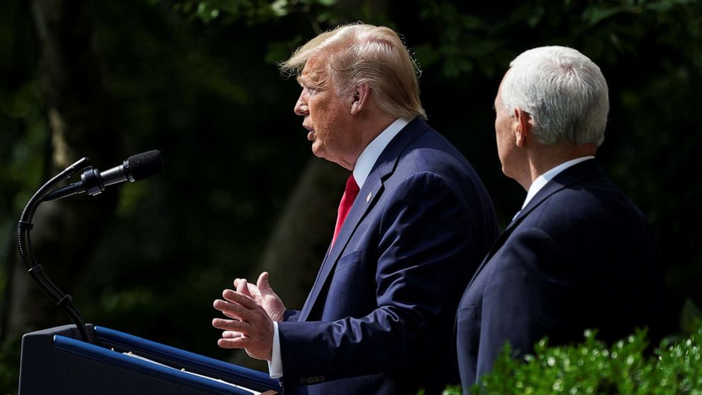 PHOTO: President Donald Trump talks about a U.S. jobs report amid the coronavirus disease (COVID-19) pandemic as he addresses a news conference as Vice President Mike Pence listens in the Rose Garden at the White House in Washington, June 5, 2020.