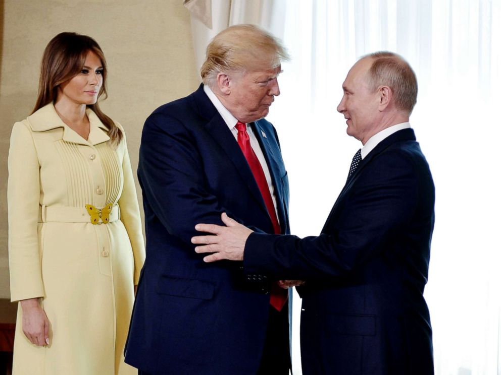 PHOTO: First lady Melania Trump, left, President Donald Trump and Russian President Vladimir Putin welcome each other at the Presidential Palace in Helsinki, Finland, July 16, 2018, prior to Trumps and Putins one-on-one meeting in the Finnish capital.