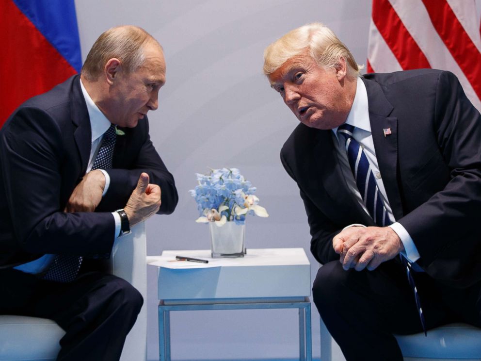 PHOTO: President Donald Trump speaks with Russian President Vladimir Putin during a meeting at the G20 Summit, July 7, 2017, in Hamburg, Germany.