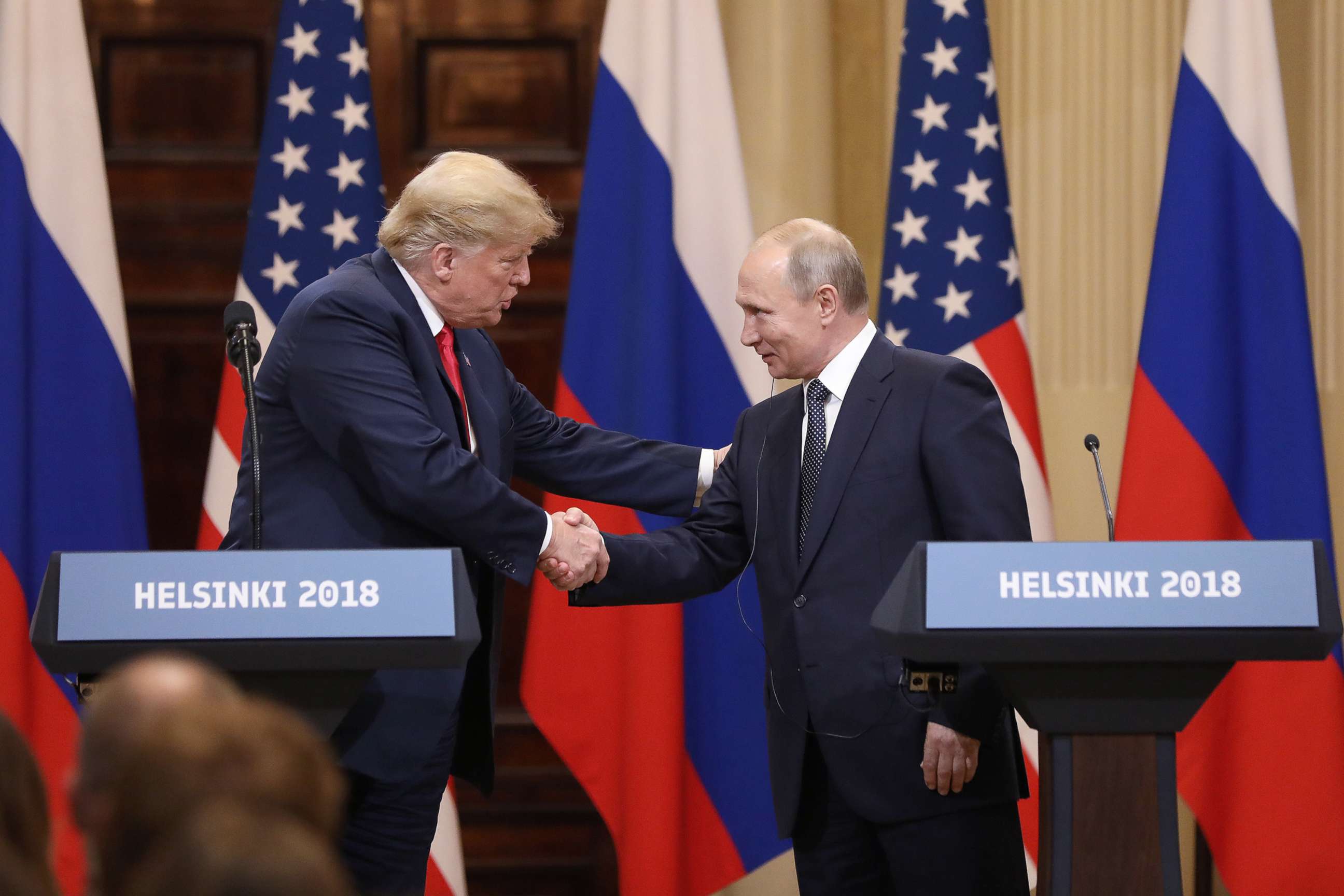 PHOTO: President Donald Trump shakes hands with Russian President Vladimir Putin during a news conference in Helsinki, Finland, July 16, 2018.