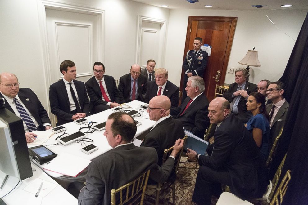 PHOTO: President Donald Trump receives a briefing, April 6, 2017, on a military strike on Syria from his National Security team.