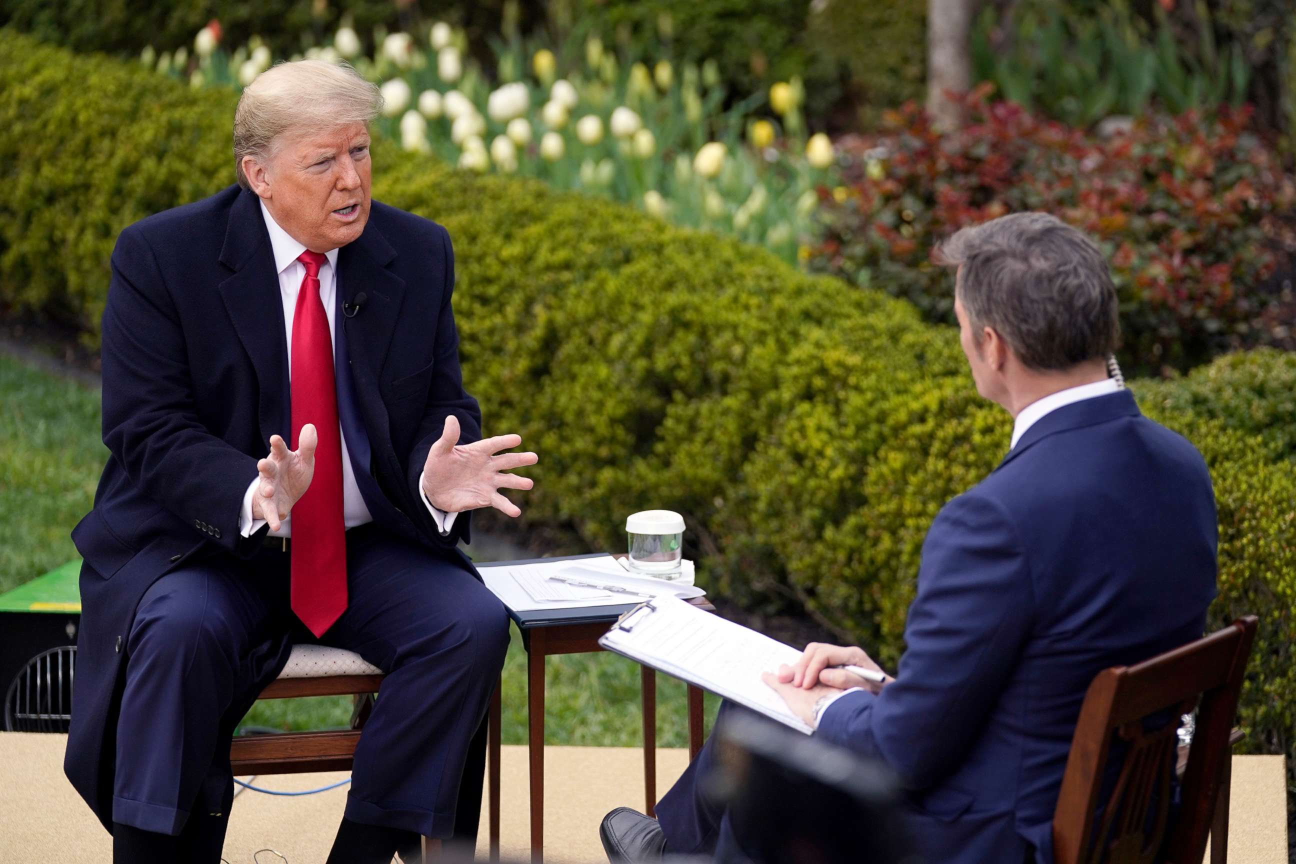 PHOTO: President Donald Trump speaks with Fox News Channel Anchor Bill Hemmer during a virtual town hall, at the White House, March 24, 2020.