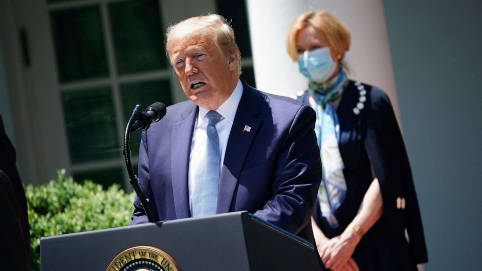 PHOTO: President Donald Trump, with Response coordinator for White House Coronavirus Task Force Deborah Birx, speaks about vaccine development, on May 15, 2020, in the Rose Garden of the White House, in Washington.