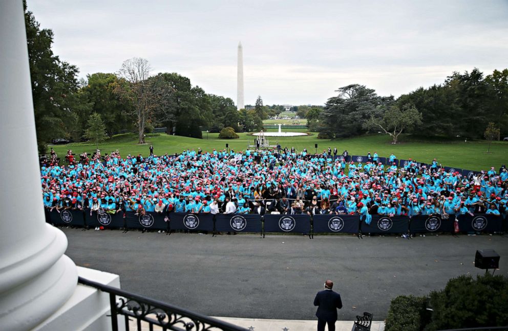 PHOTO: Supporters of President Donald Trump wait for the start of the president's campaign rally on the South Lawn in Washington, Oct. 10, 2020.