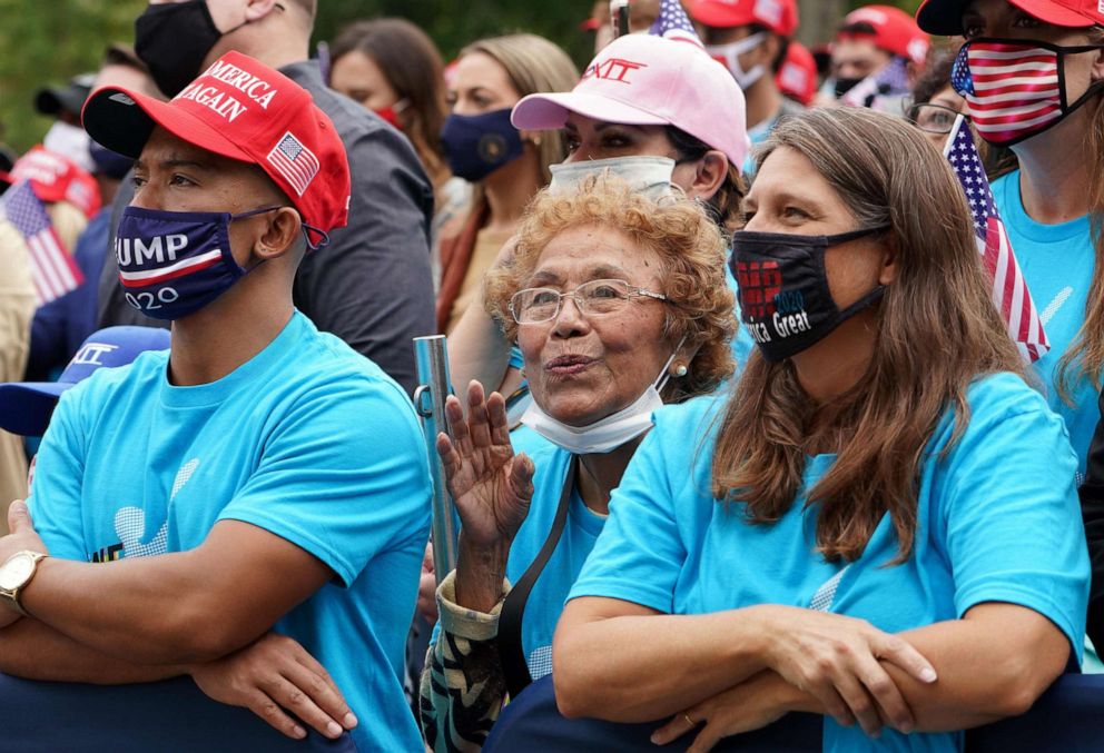 PHOTO: Supporters listen as President Donald Trump speak about law and order from the South Portico of the White House in Washington on Oct. 10, 2020. 