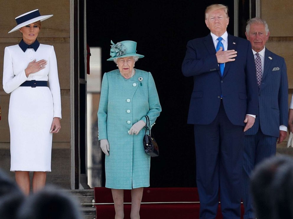 First lady Melania Trump, Britains Queen Elizabeth II, President Donald Trump, Britains Prince Charles, Prince of Wales and Britains Camilla, Duchess of Cornwall stand on the steps during a welcome ceremony at Buckingham Palace in London, June 3, 2019.