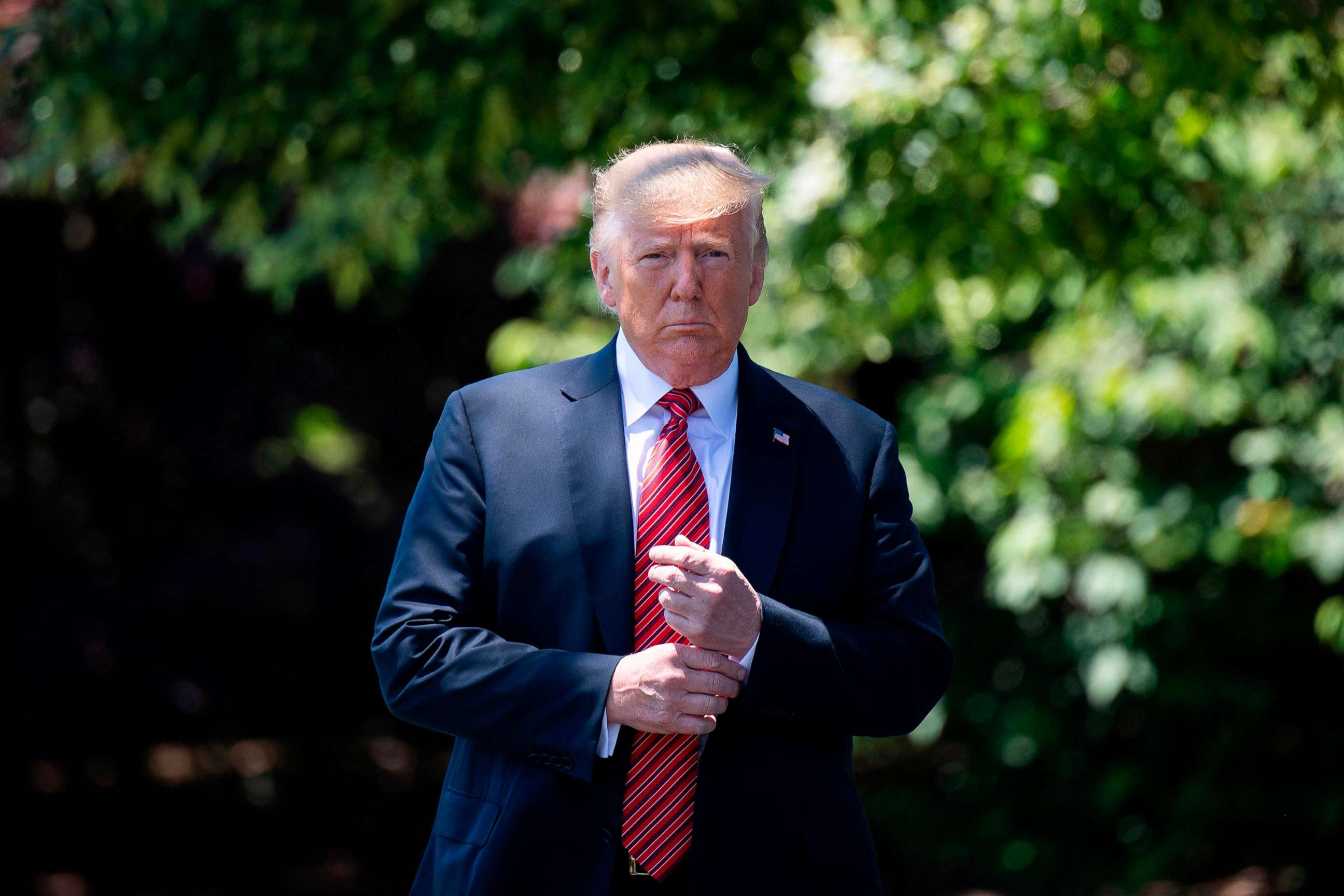 PHOTO: President Donald Trump walks out of the Oval Office to speak with reporters at the White House in Washington, D.C., June 11, 2019.