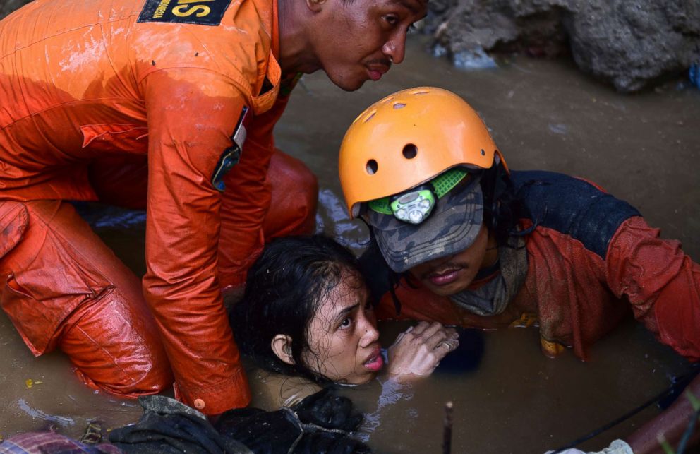 PHOTO: Rescuers try to rescue a 15-year old earthquake victim Nurul Istikharah from her damaged house following earthquakes and tsunami in Palu, Central Sulawesi, Indonesia, Sept. 30, 2018.