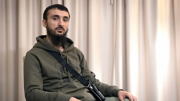 Chechen exile survives suspected assassination attempt after fighting off attacker