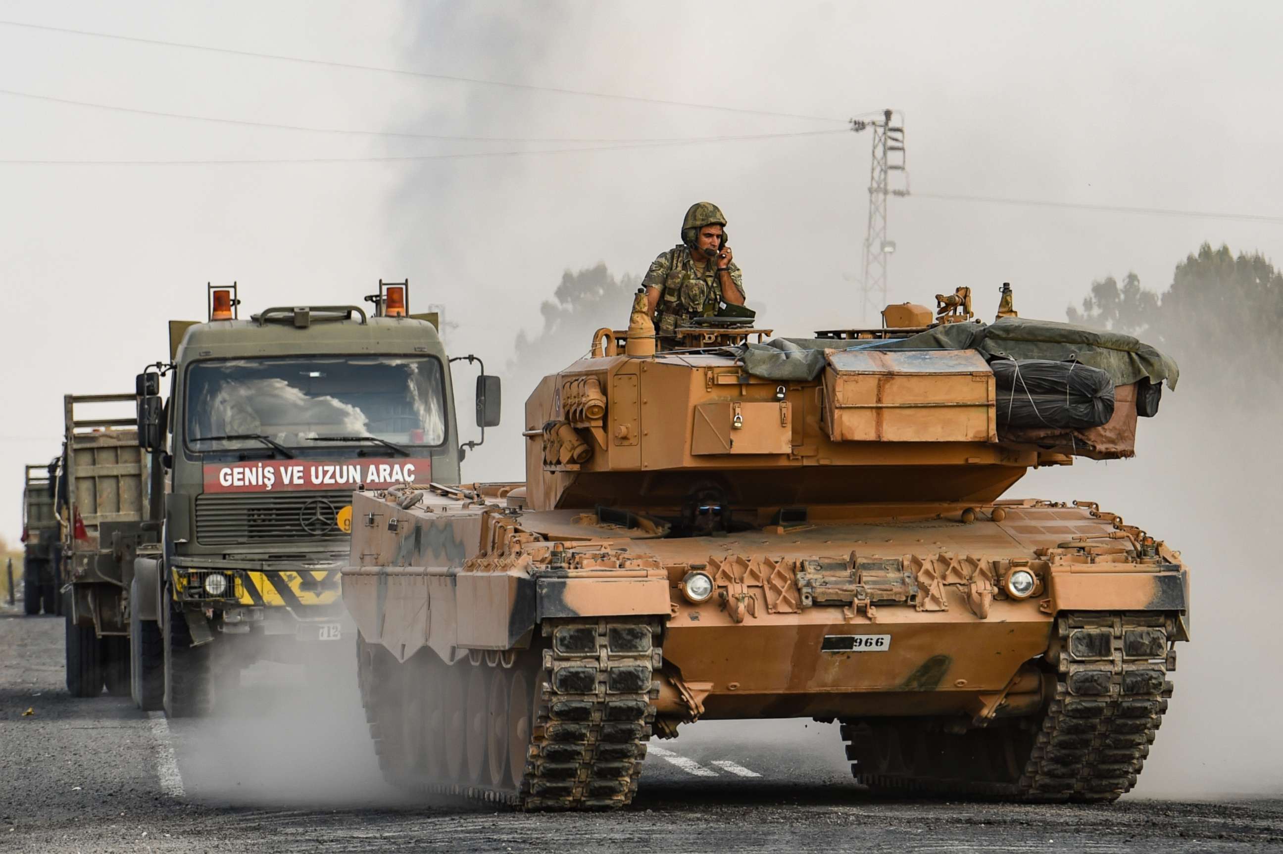 PHOTO: A Turkish army tank moves towards the Syrian border on October 18, 2019 in Ceylanpinar, Turkey.