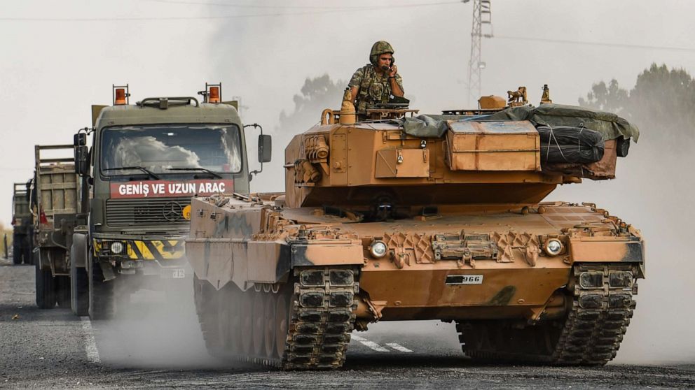 PHOTO: A Turkish army tank moves towards the Syrian border on October 18, 2019 in Ceylanpinar, Turkey.