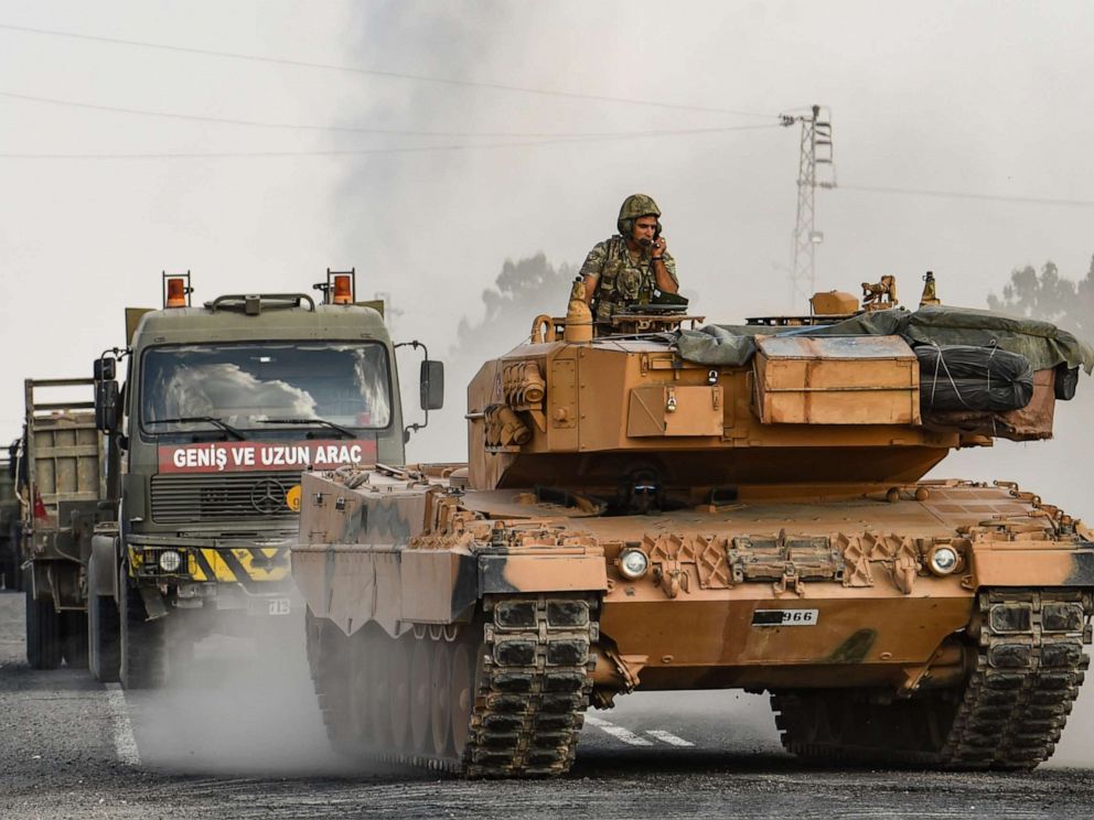 PHOTO: A Turkish army tank moves towards the Syrian border on October 18, 2019 in Ceylanpinar, Turkey.