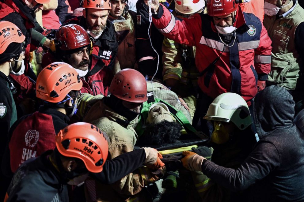 PHOTO: Rescuers carry an injured woman on a stretcher from the site of a collapsed building in Turkey, Feb. 7, 2019.