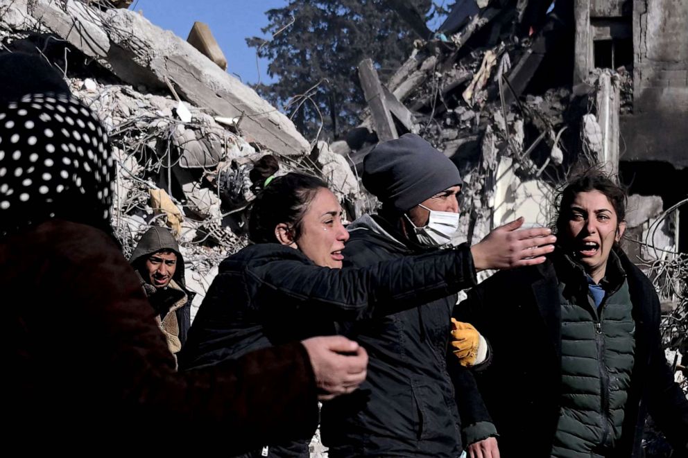 PHOTO: Relatives react after identifying a body as a family member in Kahramanmaras, southern Turkey, Feb. 13, 2023, after a 7.8 magnitude earthquake struck the border region of Turkey and Syria.