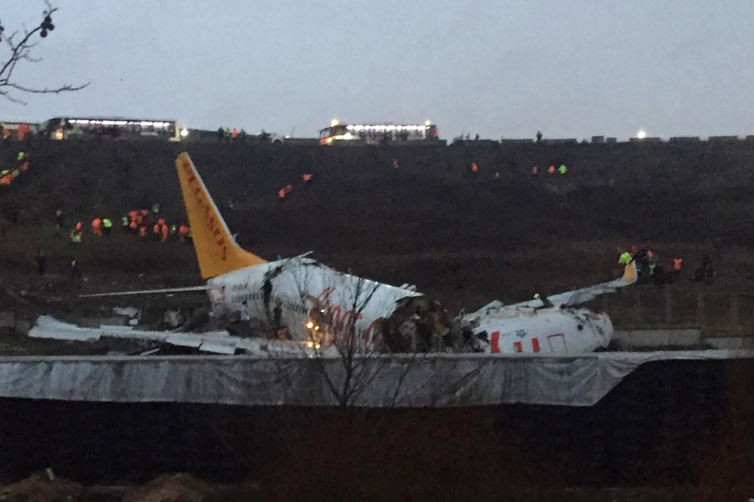 PHOTO: A Pegasus airlines Boeing 737 plane lies in pieces after it skidded off the runway at Istanbul's Sabiha Gokcen airport, Feb. 5, 2020.