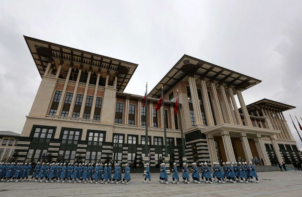 PHOTO: In this Dec. 1, 2014, file photo, military honour guard walk outside the main building of the Presidential Palace complex after a welcome ceremony for Russian President Vladimir Putin in Ankara, Turkey.