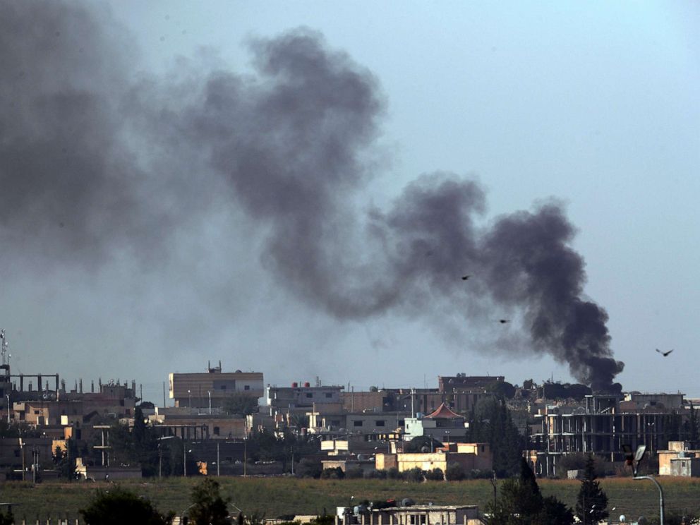 PHOTO: Smoke billows from targets in Tel Abyad, Syria, during bombardment by Turkish forces as seen from the Turkish side of the border in Akcakale, Turkey, Oct. 11, 2019.