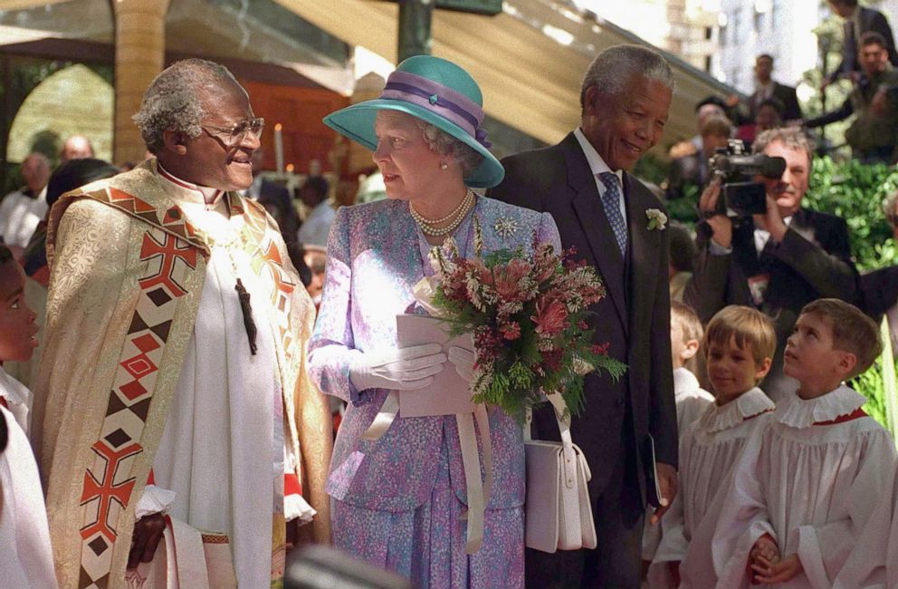 PHOTO: Queen Elizabeth with South African Archbishop Desmond Tutu and South African President Nelson Mandela, March 21, 1995, in South Africa.  