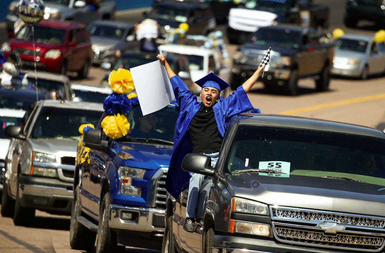 Graduation ceremony in Arizona floods in Michigan protests in