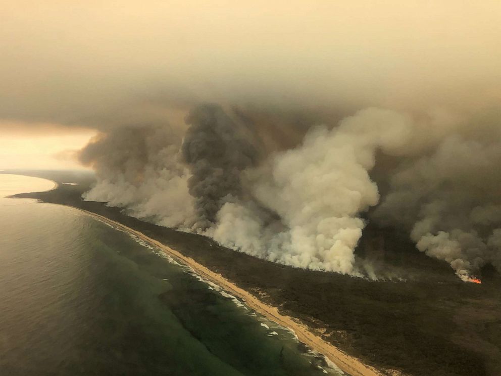 PHOTO: Thick plumes of smoke rise from bushfires at the coast of East Gippsland, Victoria, Australia , Jan. 4, 2020.