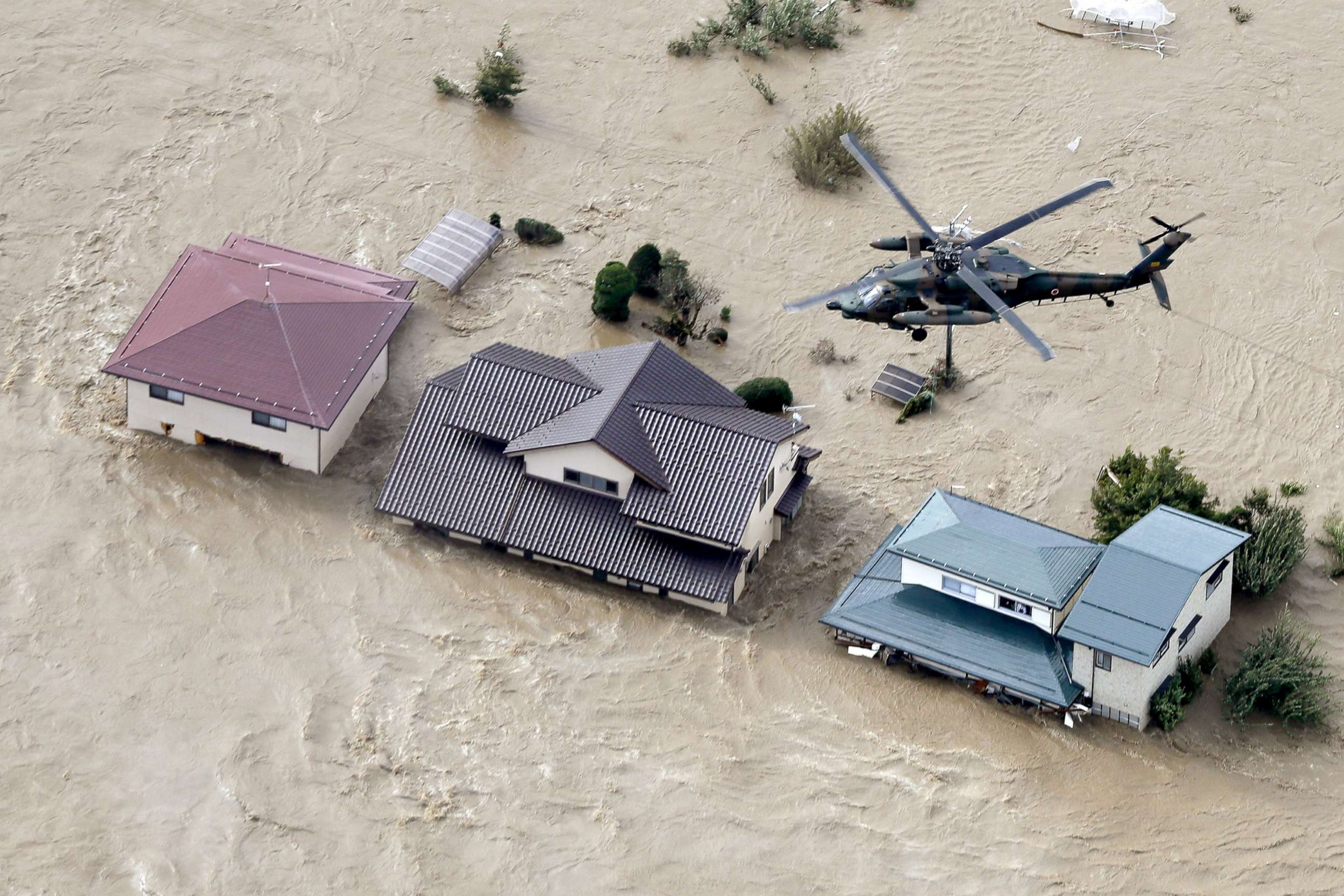 PHOTO: A photo taken from a Kyodo News helicopter, Oct. 13, 2019, shows houses in Nagano, central Japan, submerged after the Chikuma River overflowed due to Typhoon Hagibis.