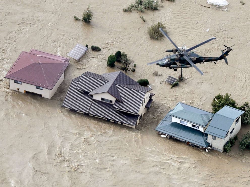 PHOTO: A photo taken from a Kyodo News helicopter, Oct. 13, 2019, shows houses in Nagano, central Japan, submerged after the Chikuma River overflowed due to Typhoon Hagibis.