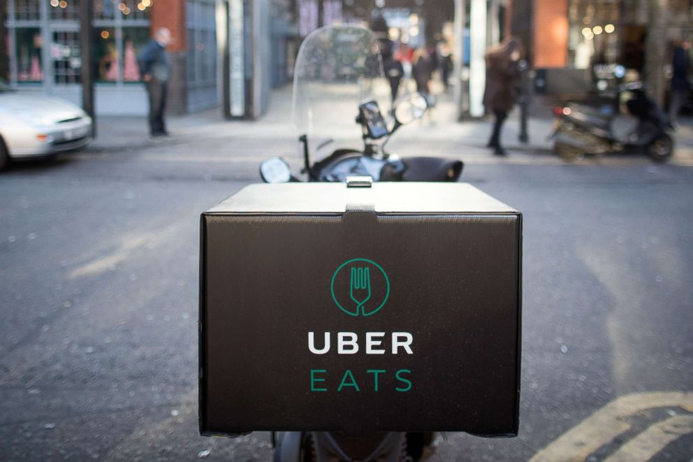 PHOTO: An UberEats, operated by Uber Technologies Inc., branded box sits on a motor scooter in London, Dec. 22, 2016.