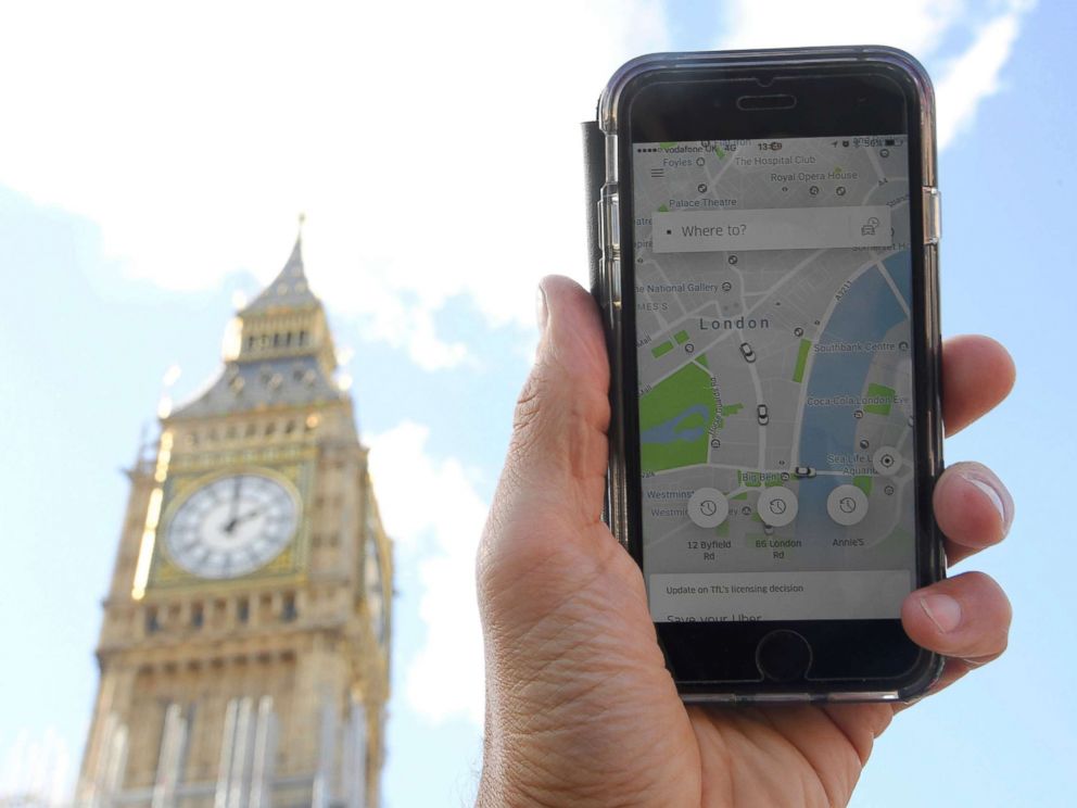 PHOTO: A photo illustration shows the Uber app on a mobile telephone, as it is held up for a posed photograph in central London, Sept. 22, 2017.